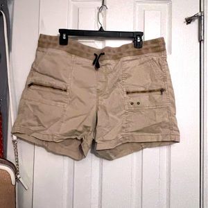 Cargo shorts with zippers, pockets and drawstring.
